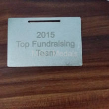 Laser engrave on back of medal