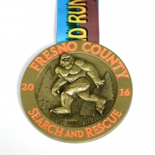 3.5" antique bronze medal with 3D raised parts in antique bronze