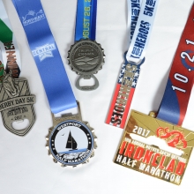 Various bottle opener medals