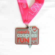 Cupid run medal with glitter