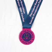 Glow run medal