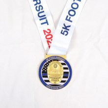 Gold police badge race medal