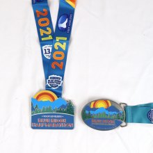 half marathon medal and double belt buckle