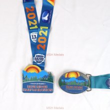half marathon medal and double belt buckle