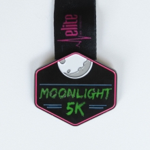 Glow in the dark medal with black dye finish