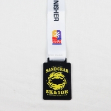 sandcrab 5k 10k nighttime beach run medal