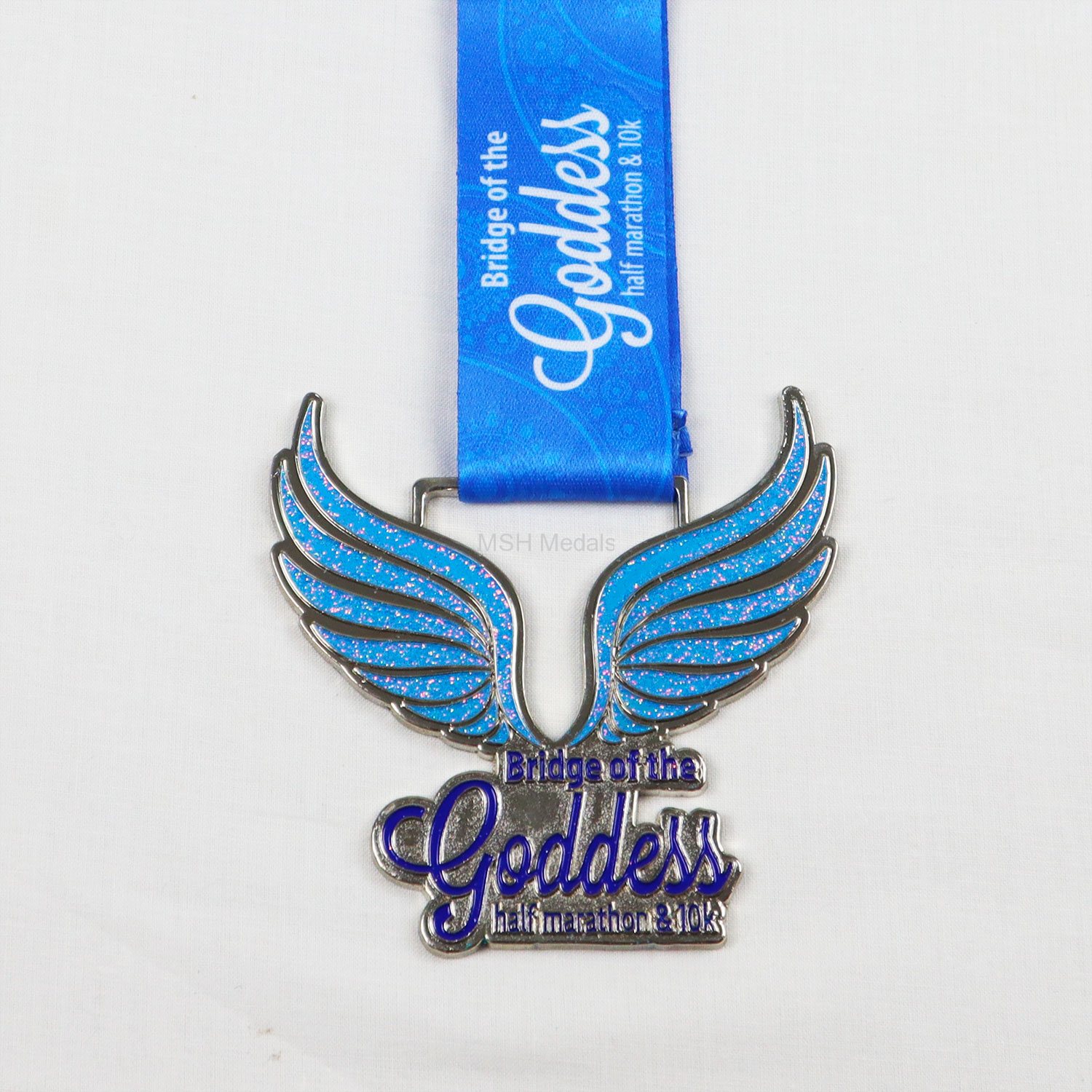 goddess half marathon 10k medal