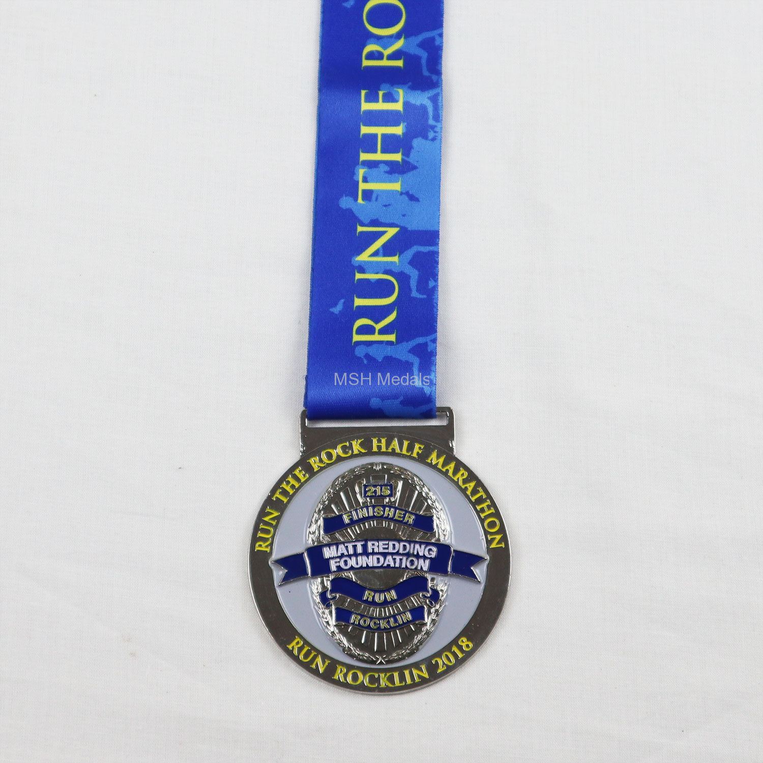 run the rock half marathon medal