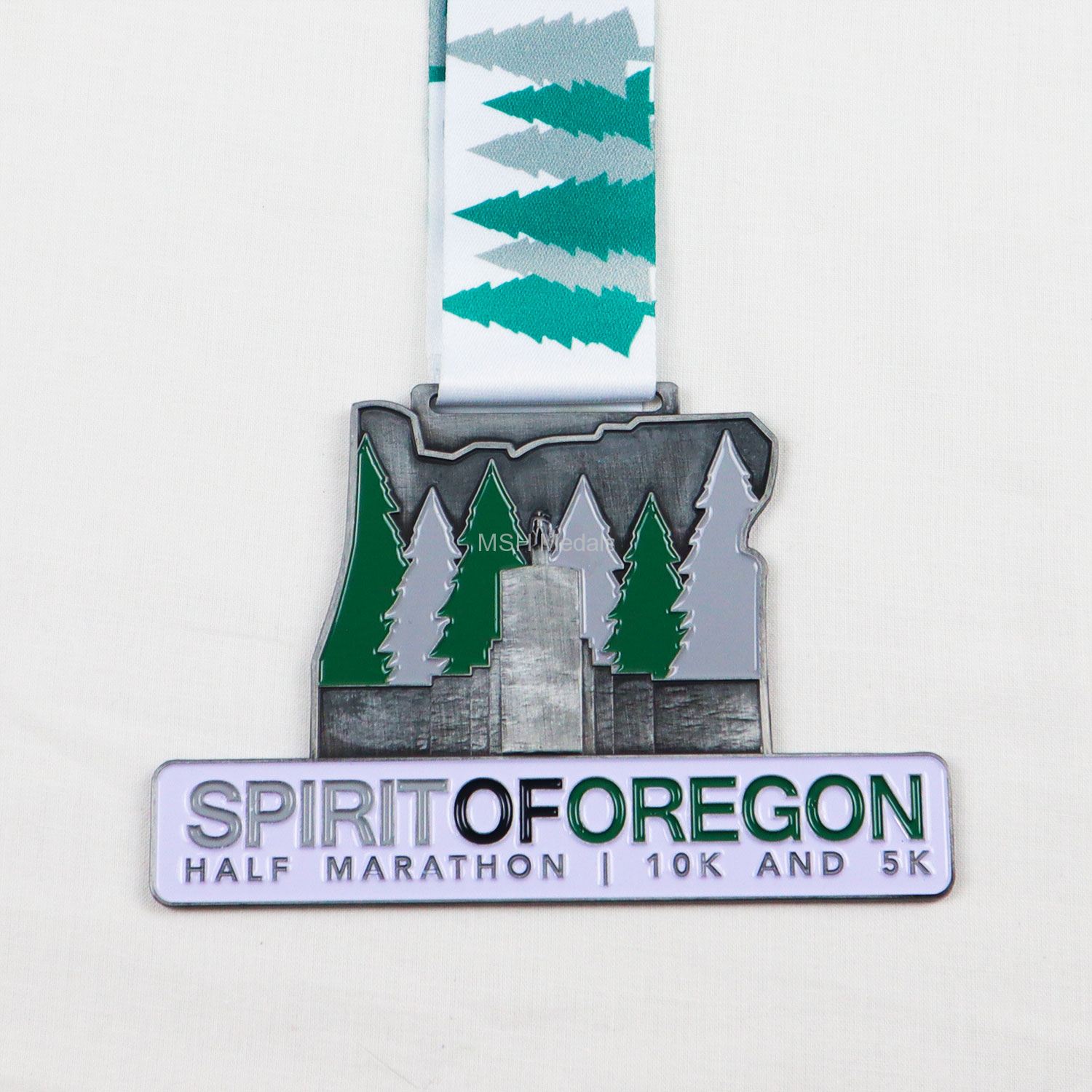 spirit of oregon half marathon 10k medal
