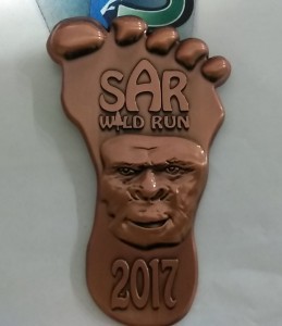 Trail run race medal in custom foot shape