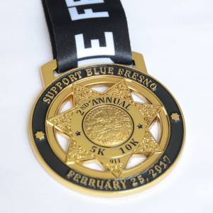 Fun run medallion made from police badge