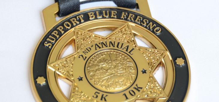 Fun run medallion made from police badge